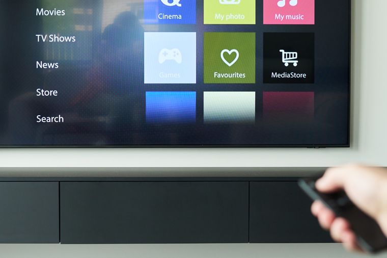 Smart TV home screen with Wi-Fi and streaming apps during a connectivity and software repair in Johannesburg